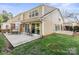 Spacious patio with seating area, adjacent to the home at 7062 Quail Hill Rd, Charlotte, NC 28210