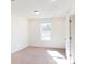 Spacious bedroom with carpeted floors and large window at 3543 Nimbell Rd, Monroe, NC 28110