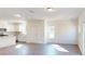 Bright and airy living area with hardwood floors and kitchen views at 3543 Nimbell Rd, Monroe, NC 28110