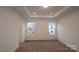 Main bedroom with two windows and carpeted floor at 3543 Nimbell Rd, Monroe, NC 28110