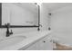 Modern bathroom with white vanity, double sinks, and marble shower at 7415 Linda Lake Dr, Charlotte, NC 28215