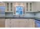 Well-lit kitchen with ample storage, undermount sink, granite countertop, and stainless steel appliances at 94 Heritage Dr, Lake Wylie, SC 29710