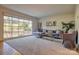 Spacious living room featuring a large window, plush seating, and a modern decor at 94 Heritage Dr, Lake Wylie, SC 29710