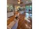 Spacious living room with hardwood floors and a glimpse into the modern kitchen at 94 Heritage Dr, Lake Wylie, SC 29710