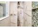 Close-up of a luxurious shower featuring rainfall shower head and body jets at 94 Heritage Dr, Lake Wylie, SC 29710