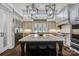 Elegant kitchen featuring a marble island, stainless steel appliances, and custom cabinetry at 109 Twiggs Ln, Mooresville, NC 28117