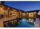 Luxury home featuring a private pool, hot tub, and spacious outdoor living area with covered patio at 109 Twiggs Ln, Mooresville, NC 28117
