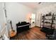 Bonus room featuring sailboat wallpaper and an upright piano at 126 Fleming Dr, Statesville, NC 28677