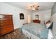 Main bedroom with wooden floors, a ceiling fan, and wooden furniture at 126 Fleming Dr, Statesville, NC 28677