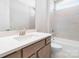 Modern bathroom with stone-look wall tile and granite vanity top at 3067 Trace Meadow Ct, York, SC 29745