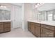 Bright bathroom featuring dual vanities with a glass shower and tile floors at 3067 Trace Meadow Ct, York, SC 29745