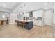 Beautiful kitchen with stainless steel appliances, island with barstool seating, and ample cabinet space at 3067 Trace Meadow Ct, York, SC 29745