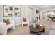 Cozy living room with modern decor, featuring neutral walls and natural light, creating a serene and inviting atmosphere at 3067 Trace Meadow Ct, York, SC 29745