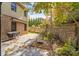 Spacious brick patio with grill and autumn landscaping at 119 42Nd Avenue Nw Dr, Hickory, NC 28601