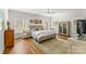 Spacious bedroom with hardwood floors, large windows, and ample closet space at 119 42Nd Avenue Nw Dr, Hickory, NC 28601