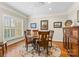 Formal dining room with hardwood floors and large windows at 119 42Nd Avenue Nw Dr, Hickory, NC 28601