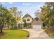 Two-story home with a two-car garage and manicured lawn at 119 42Nd Avenue Nw Dr, Hickory, NC 28601