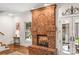 Large brick fireplace as a focal point in living room at 119 42Nd Avenue Nw Dr, Hickory, NC 28601