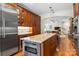 Kitchen island with granite countertop, microwave, and wine cooler at 119 42Nd Avenue Nw Dr, Hickory, NC 28601