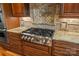 Gas cooktop with custom cabinetry and granite countertops at 119 42Nd Avenue Nw Dr, Hickory, NC 28601