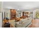 Living room with hardwood floors, a fireplace, and an open kitchen at 119 42Nd Avenue Nw Dr, Hickory, NC 28601