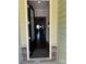 Inviting entryway featuring dark wood floors, neutral walls, and a decorative rug welcoming you home at 129 Johnson Manor St, Mooresville, NC 28115