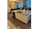 Open concept kitchen with granite countertops and stainless steel appliances, great for entertaining guests at 129 Johnson Manor St, Mooresville, NC 28115