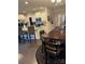 Kitchen with granite countertops, white cabinets, and stainless steel appliances offers a functional cooking space at 129 Johnson Manor St, Mooresville, NC 28115