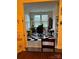 Home office with large windows, desk, and a black and white checkerboard rug at 129 Johnson Manor St, Mooresville, NC 28115