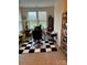 Bright office with large windows, a desk, and a decorative bookshelf at 129 Johnson Manor St, Mooresville, NC 28115