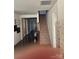 Bright staircase has carpeted steps and a view of the hallway, creating a welcoming transition between floors at 129 Johnson Manor St, Mooresville, NC 28115