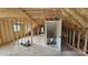 Unfinished attic with open floor plan and framed walls at 1703 Polk St, Monroe, NC 28110