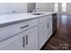 White shaker cabinets and quartz countertops in a modern kitchen at 2208 Noble Townes Way, Charlotte, NC 28262