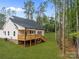 Back exterior view of home featuring a wooden deck perfect for entertaining at 315 Bonaventure Dr, Salisbury, NC 28147