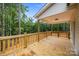 Back porch featuring new railing, wood floors and view of the backyard at 315 Bonaventure Dr, Salisbury, NC 28147