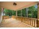 Back porch featuring new railing, wood floors and view of the backyard at 315 Bonaventure Dr, Salisbury, NC 28147