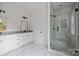 Bathroom features double vanity with granite countertop and modern hardware, plus glass enclosed shower at 315 Bonaventure Dr, Salisbury, NC 28147