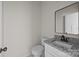 Bathroom has a sleek sink, toilet, gray-flecked counter, and modern fixtures at 315 Bonaventure Dr, Salisbury, NC 28147