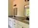 A stylish bathroom features double sinks, granite countertops, modern lighting, and sleek black hardware at 315 Bonaventure Dr, Salisbury, NC 28147