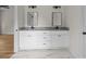 Bathroom with double vanity, granite countertop, modern hardware and fixtures, and marble-look floor at 315 Bonaventure Dr, Salisbury, NC 28147