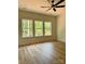 Bedroom with three windows offering beautiful views of the surrounding nature at 315 Bonaventure Dr, Salisbury, NC 28147