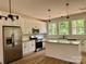 Kitchen with granite countertops, stainless steel appliances and island with pendant lighting at 315 Bonaventure Dr, Salisbury, NC 28147