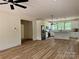 Open floor plan showing the kitchen with granite countertops, stainless appliances, and island at 315 Bonaventure Dr, Salisbury, NC 28147