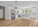 Modern kitchen featuring white cabinets, stainless steel appliances, granite countertops, and a center island at 315 Bonaventure Dr, Salisbury, NC 28147