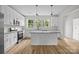 Modern kitchen with white cabinets, stainless steel appliances, and granite countertops at 315 Bonaventure Dr, Salisbury, NC 28147