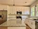 Beautiful kitchen with stainless steel appliances, modern island and granite countertops at 315 Bonaventure Dr, Salisbury, NC 28147