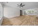 Bright, open-concept living room flowing into a modern kitchen with stainless steel appliances and a central island at 315 Bonaventure Dr, Salisbury, NC 28147