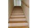 View of the staircase, showcasing the wood and white accents at 315 Bonaventure Dr, Salisbury, NC 28147