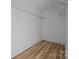 A large walk-in closet with ample shelving and wood-look floors at 315 Bonaventure Dr, Salisbury, NC 28147