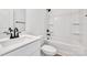 Clean bathroom features a tub, modern fixtures, and white fixtures at 606 Meadow Ave, Spencer, NC 28159